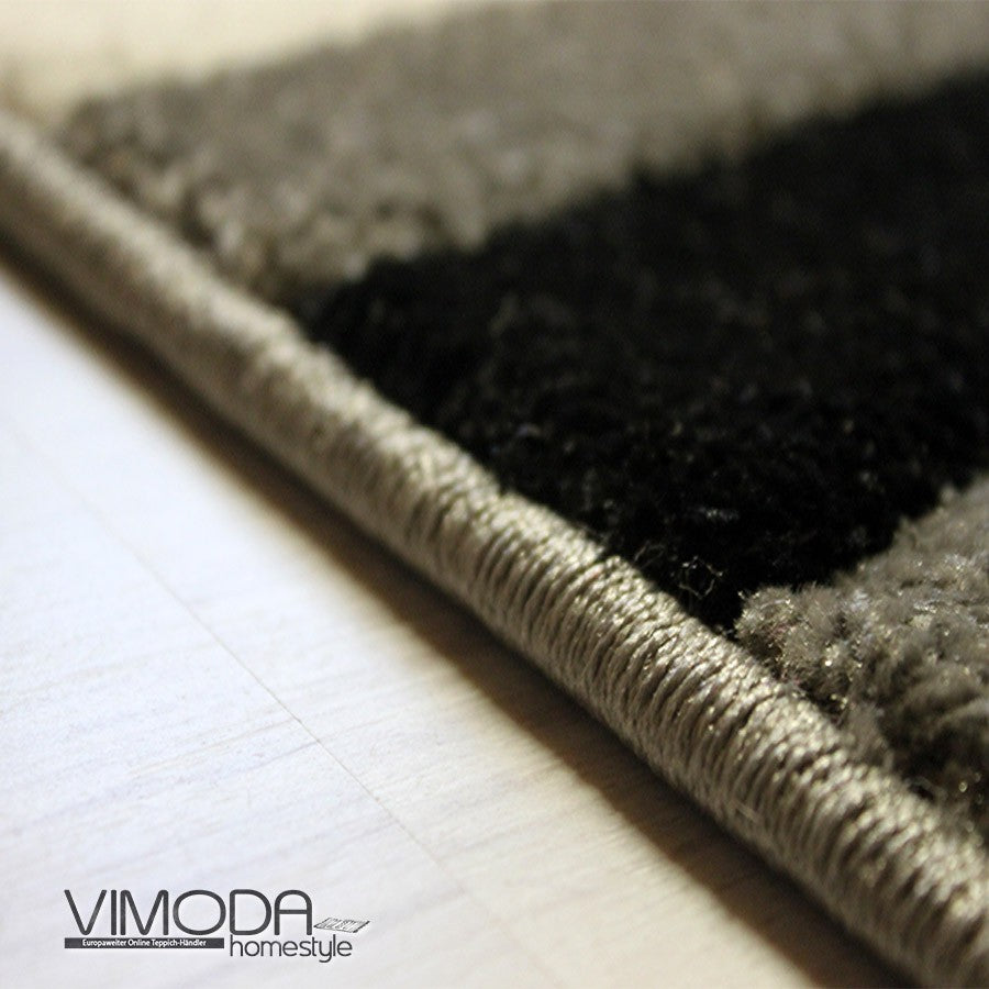 Designer rug with curved lines in grey, white and black. Harmonious.-3