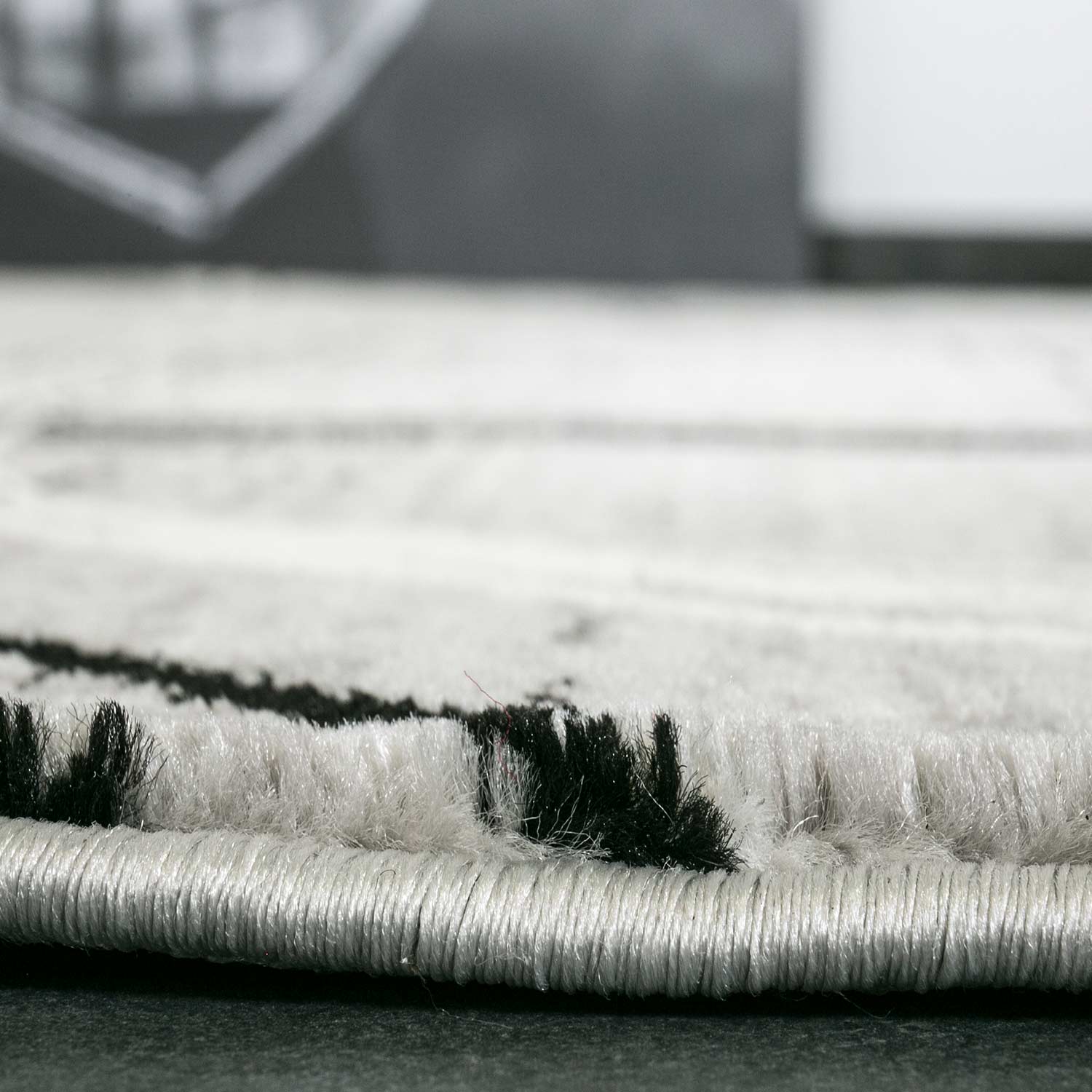 Designer rug, modern swirl pattern, mottled in grey and black-zoom-2