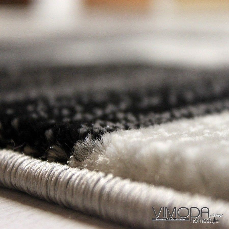 Designer living room rug, grey anthracite checkered retro with geometric motifs and color gradient-zoom-