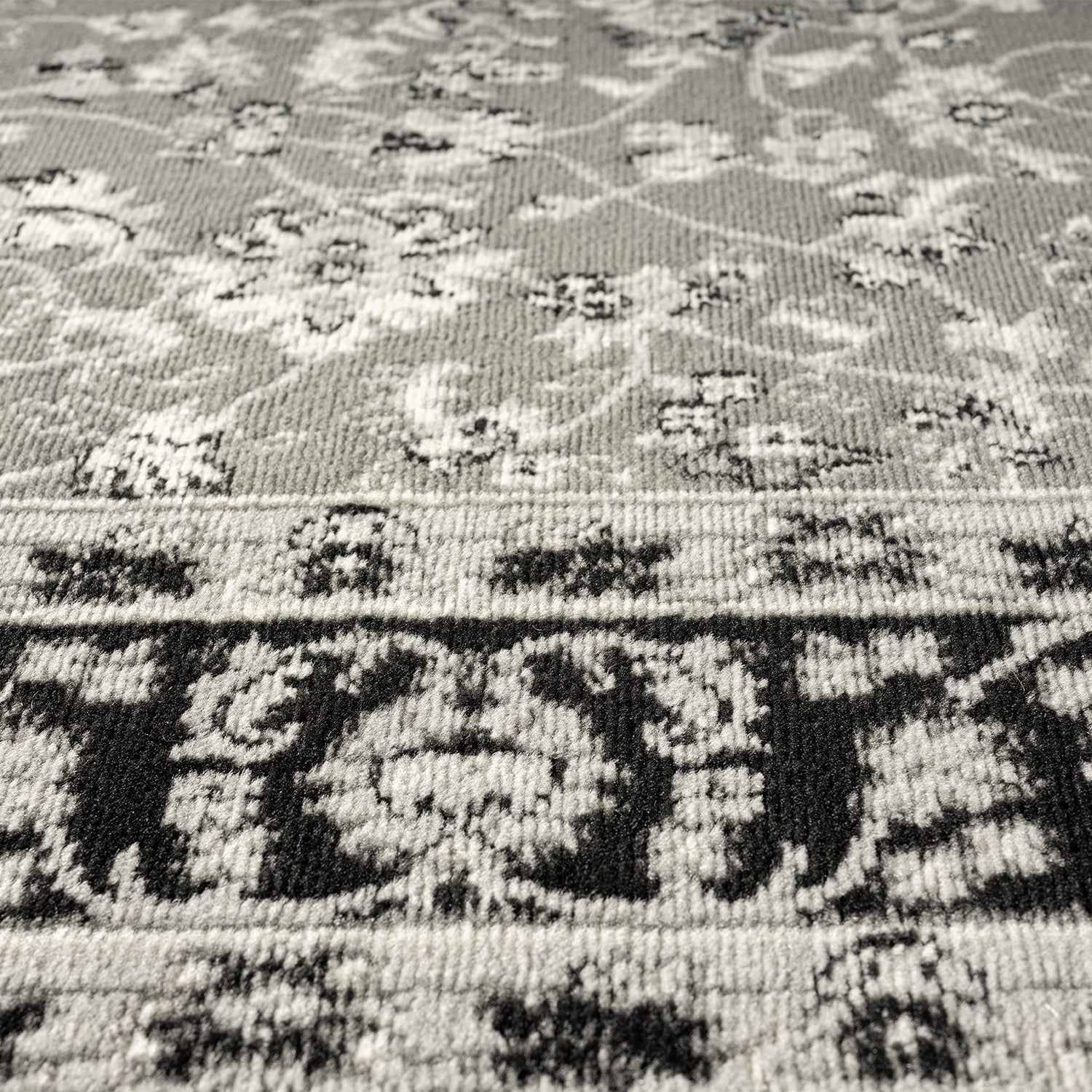 Oriental rug, grey and black, classically densely woven with ornament and floral motifs.-3