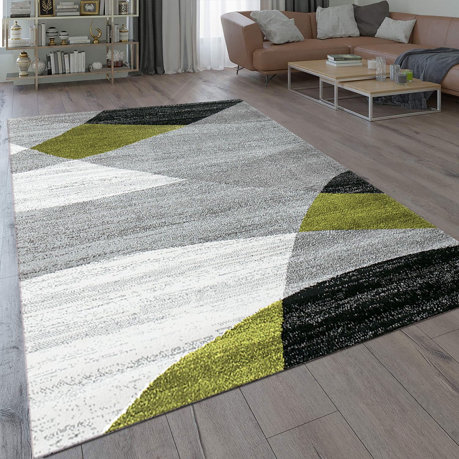 Geometric patterned rug in green, grey, white, and black, short pile, for living room