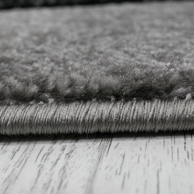 Designer living room rug, grey checkered with color gradient and contour cut-zoom-